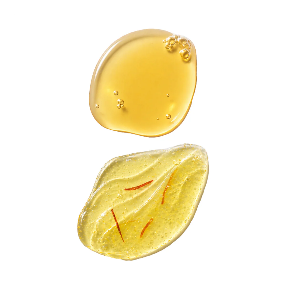 Saffron Symphony product swatches featuring Celestial Saffron Elixir Face Serum and Krocus Kiss Radiance Face Gel, showcasing lightweight saffron-infused oil and water-based gel textures