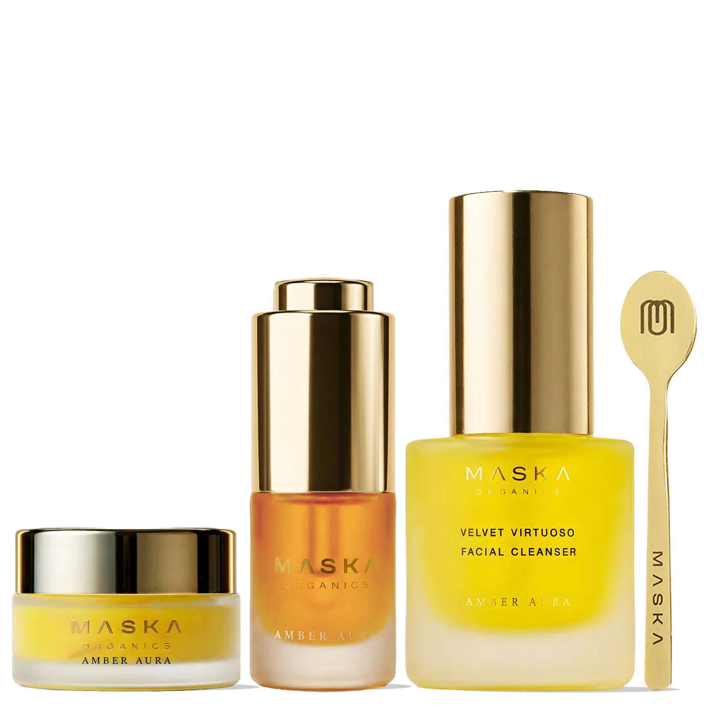 Maska Organics Serene Saffron Suite Premiere travel-size Ayurvedic skincare collection featuring Velvet Virtuoso Facial Cleanser 30ml, Celestial Saffron Elixir Face Serum 5ml, Krocus Kiss Radiance Face Gel 10g and signature brass applicator, designed to cleanse, brighten and hydrate skin