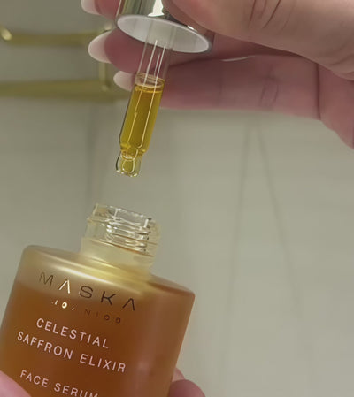 Maska Organics Celestial Saffron Elixir Face Serum video — showcasing the luxurious saffron-infused serum texture, golden botanical formula and lightweight oil-based consistency for radiant-looking skin
