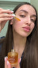 Demonstration video featuring Celestial Saffron Elixir face serum application and lightweight nourishing texture